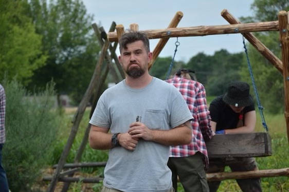Photo of Eric Anderson in the field doing archaeology. 